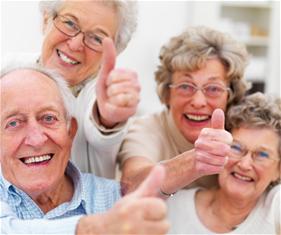 Older people giving a thumbs up